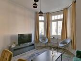 TV und Sessel im Erker - (EF1008_M) Chemnitz: Kaßberg, schönes möbliertes Apartment in einer sanierten Stadtvilla, WLAN inklusive