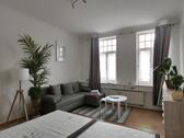 Sitzecke im Wohnzimmer - 1 Zimmer Etagenwohnung zur Miete in Erfurt