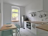Esstisch in der Küche - (EF0898_M) Erfurt: Johannesvorstadt, neu sanierte und neu möblierte 3-Zimmer-Wohnung im Hochparterre mit Garten, WLAN