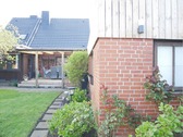 Ansicht auf Rückseite und Werkstatt-Anbau des Hauses - Einfamilienhaus mit 125,00 m² in Brunsbüttel zum Kaufen