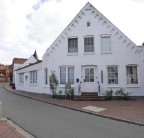 Charmantes StadthausMehrfamilienhaus mit 3 Wohnungen in 25836 Garding zu verkaufen.