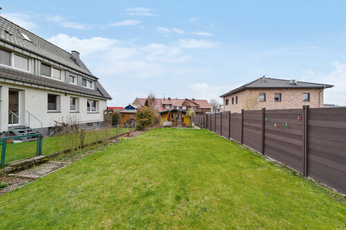 Rasenfläche - Reihenmittelhaus mit 81,96 m² in Altenberge zum Kaufen