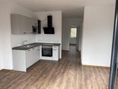 Küche - Neubau, Balkon - 750,00 EUR Kaltmiete, ca.  83,17 m² Wohnfläche