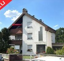 Attraktives Zweifamilienhaus mit Potenzial in bester Lage von Mühlheim!