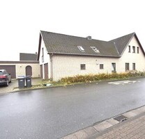3 Fam. Haus mitten in Syke + Garagen + lfd. Mietverträge mit Renovierungsbedarf