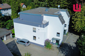 Luftansicht - WINDISCH IMMOBILIEN - Attraktive Wohnung mit großer Dachterrasse am Ortsrand von Gröbenzell.