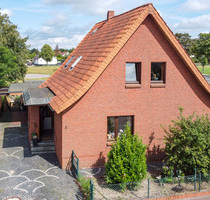 Wohngenuss mit Charme - gepflegtes Ein- bis Zweifamilienhaus mit Wintergarten - Lemförde