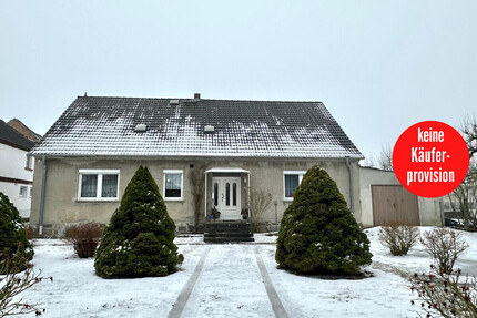 HORN IMMOBILIEN + freistehendes Einfamilienhaus mit Nebengebäude und schönem Grundstück, ruhige Lage - Uckerland