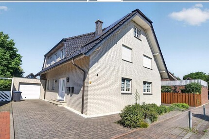 Wohnen wie im eigenen Haus – Große Erdgeschosswohnung mit Traumgarten und Garage im Zweiparteienhaus - Olfen