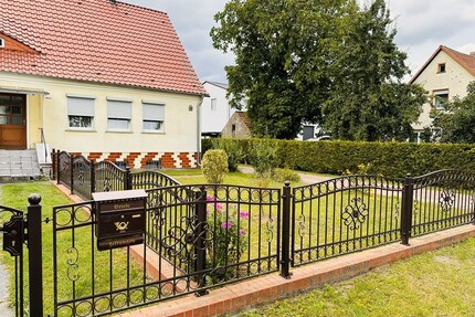 Idyl., gepflegtes 1.277 qm Grundstück inkl. DHH mit Nebengelass, Keller - Gartenbereich - Wriezen!