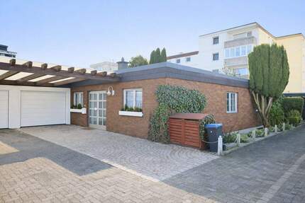 Einseitig angebauter, teilunterkellerter Bungalow mit Garage in ruhigem Stichweg auf Kaufgrundstück. - Oer-Erkenschwick Groß-Erkenschwick